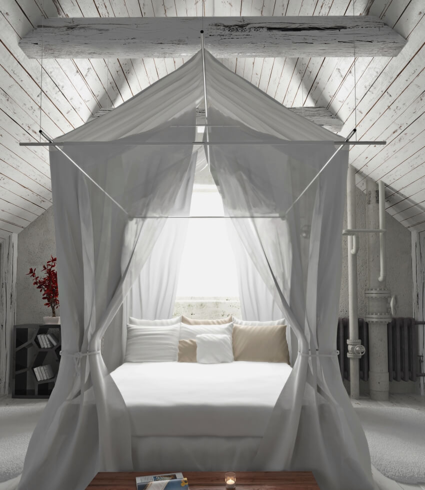 Rustic charming bedroom with draped canopy bed hanging from the ceiling