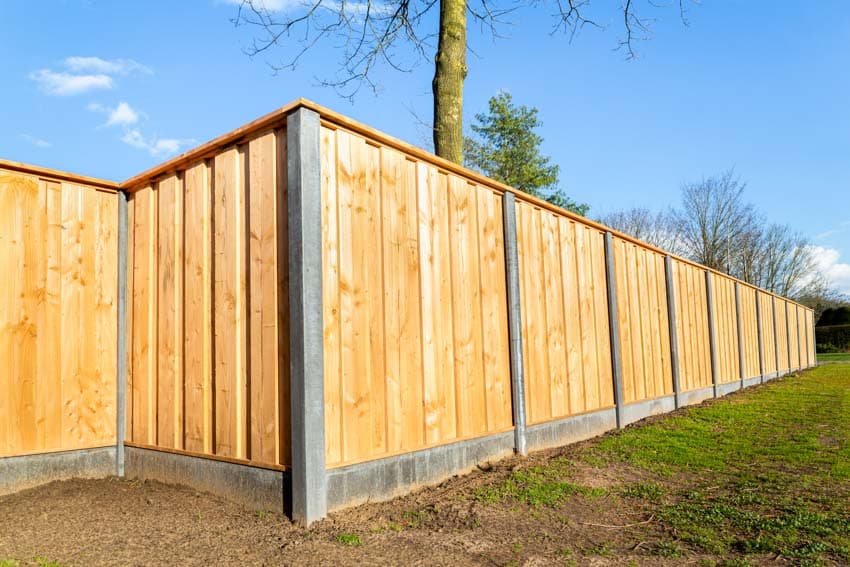Flat top shadow box fence made of wood for house exterior areas