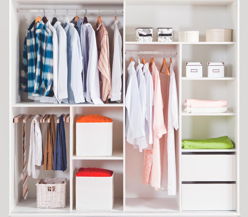 Small men's closet with hangers, shelves, and drawers