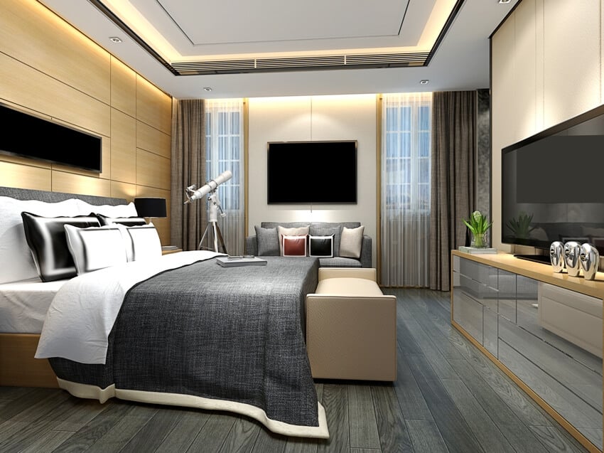 Stunning bedroom design features dark floors and modern furniture