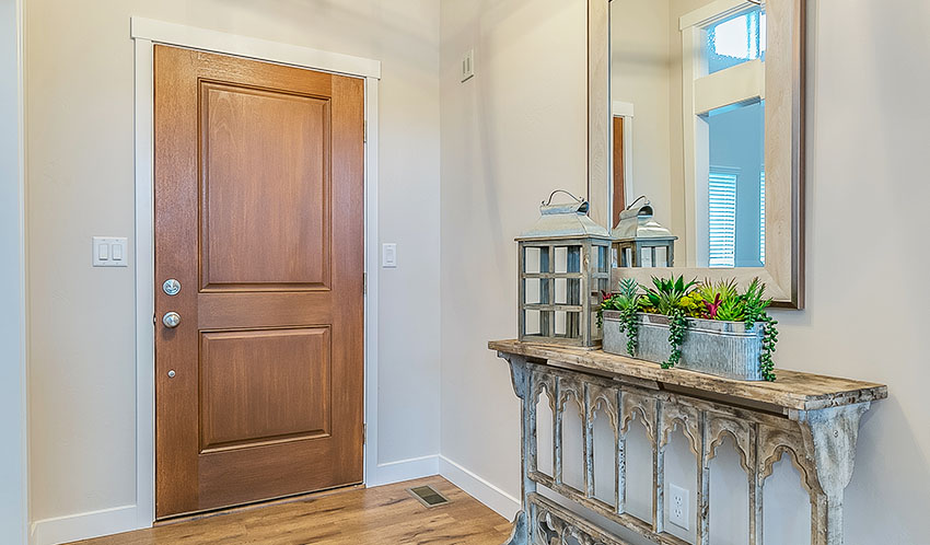 Entryway with entryway table light beige paint