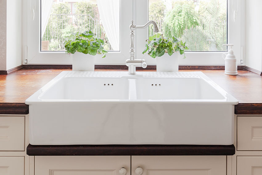 Fireclay kitchen sink with wood countertops