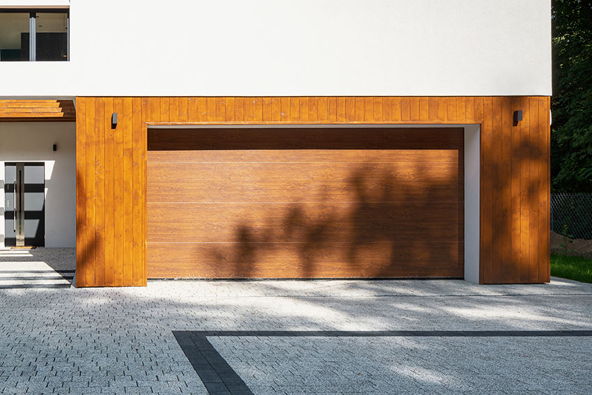 Garage door vinyl wrap with concrete paver floor