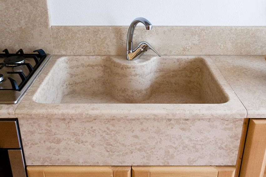 Natural stone sink with standard single handle faucet