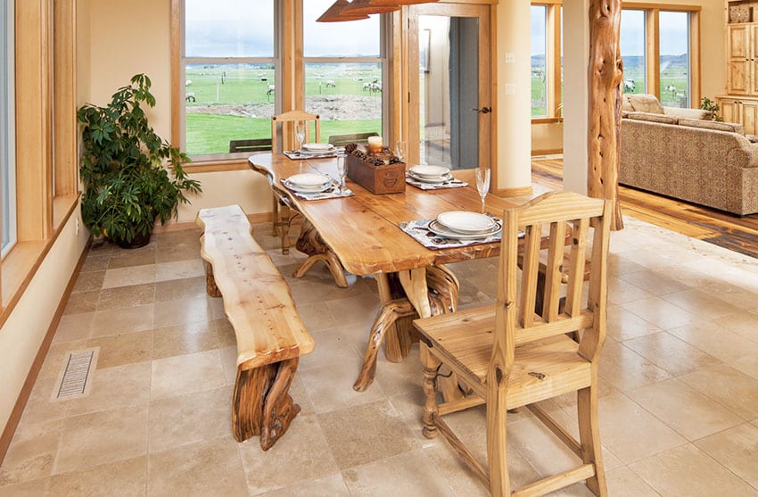 Rustic farmhouse with wooden dining table and double hung windows