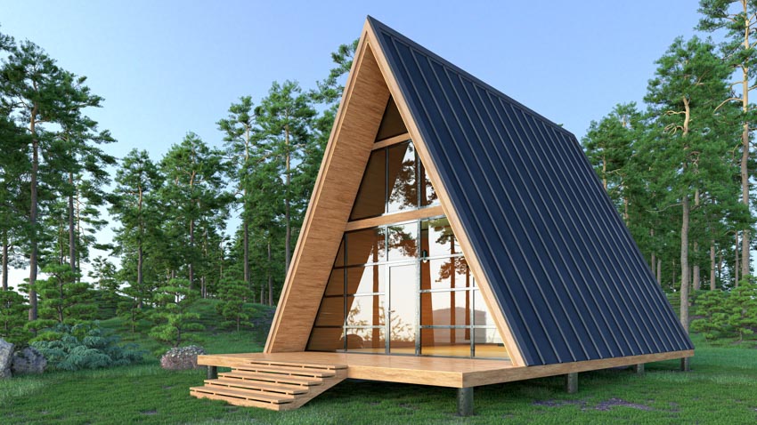 A-frame tiny house with angled roof, glass windows, door, and wood deck