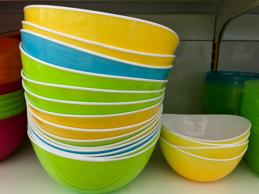 A stack of colorful melamine bowls
