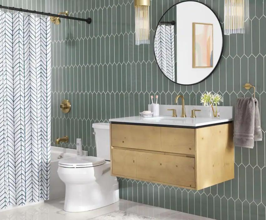 Bathroom with floating vanity and green backsplash