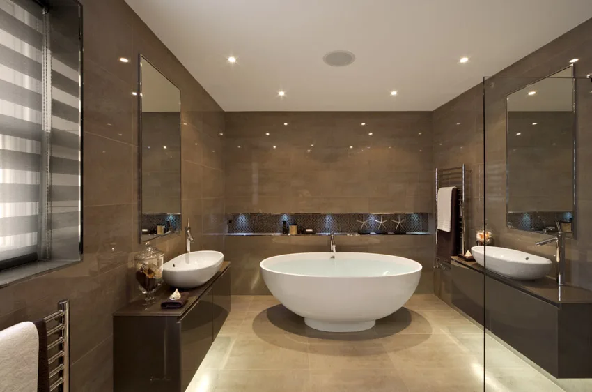 Bathroom with tub, vanity mirror, sink, windows, glazed porcelain tile wall, and flooring