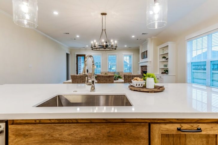 Undermount Sink Vs Drop In Sink Pros And Cons   Beautiful Home With Close Up Of Stainless Steel One Handed Faucet And Undermount Sink In The Kitchen Is 728x486 