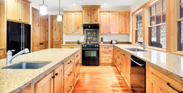 Beautiful Kitchen With Cedar Cabinets Granite Countertops And Black Appliances Ss 608x311 