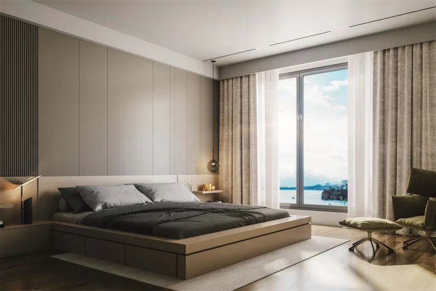 Bedroom with windows, curtain, nightstand, lamps, taupe walls, glass window, and curtains
