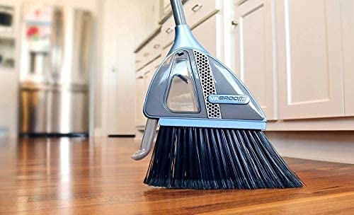 Broom with built in vacuum