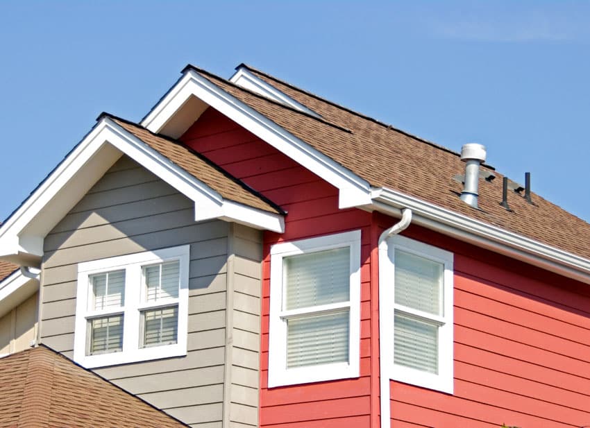 Brown and red house with siding