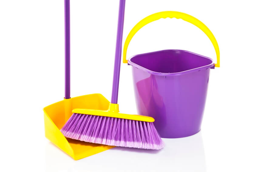 A bucket, scrub broom and dustpan on white background 