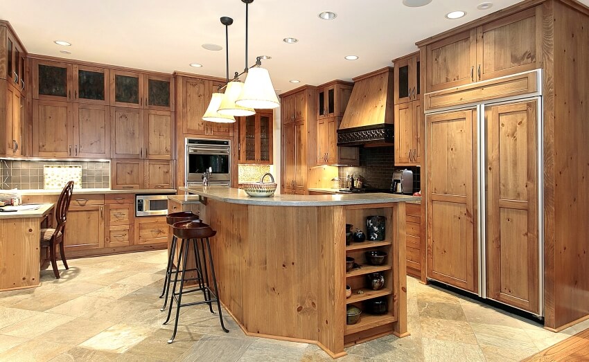 Crafts and arts kitchen design with pendant lighting, tile floors and large island