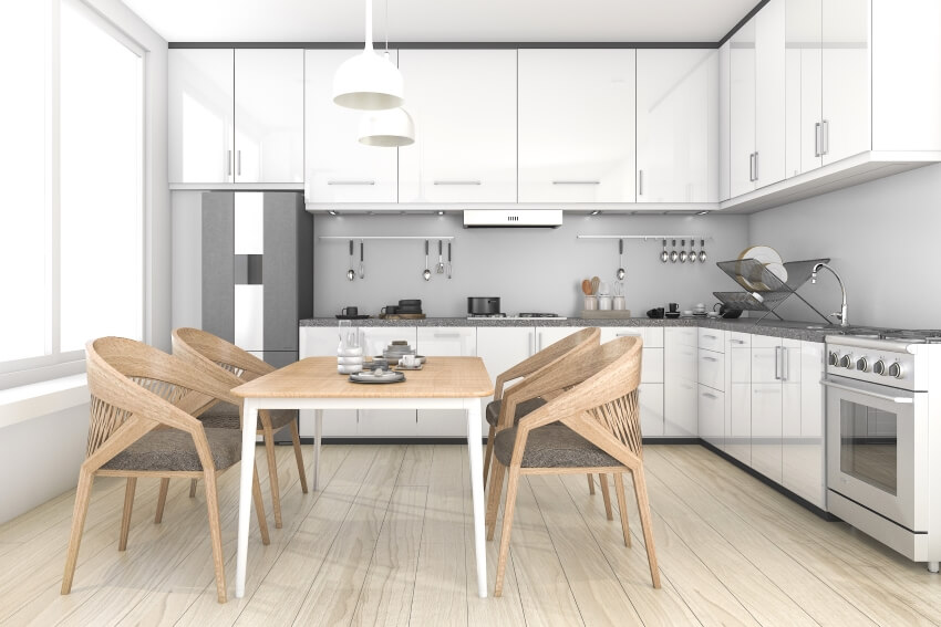 Dining room with wooden floors, large windows and chrome dish rack