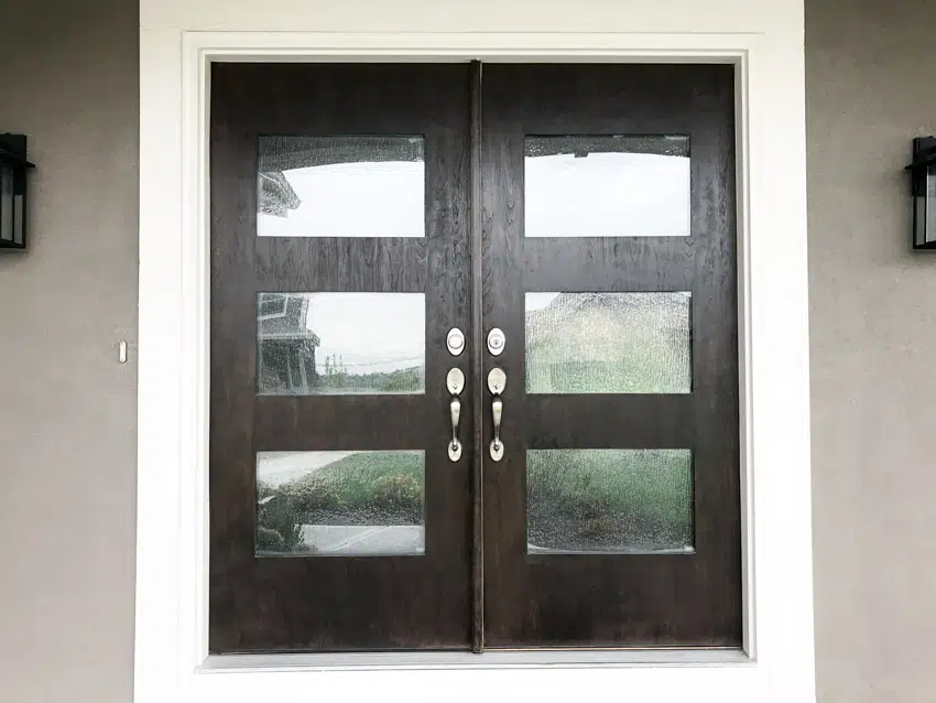 Front door with frosted glass panels and knob