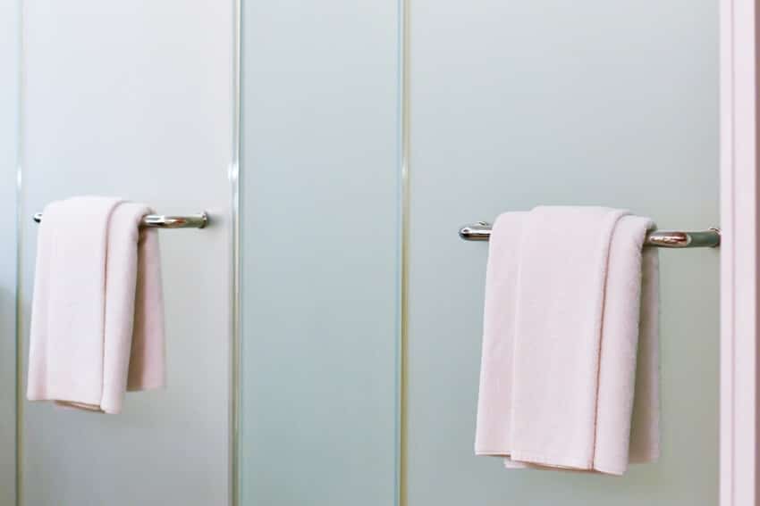 Door with towel holder with light pink towel