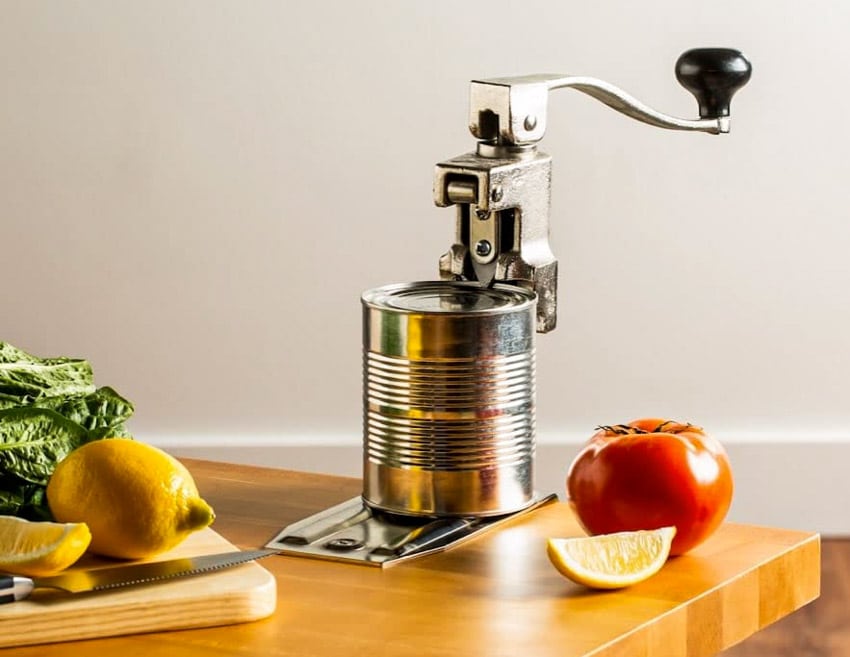 Kitchen with countertop can opener