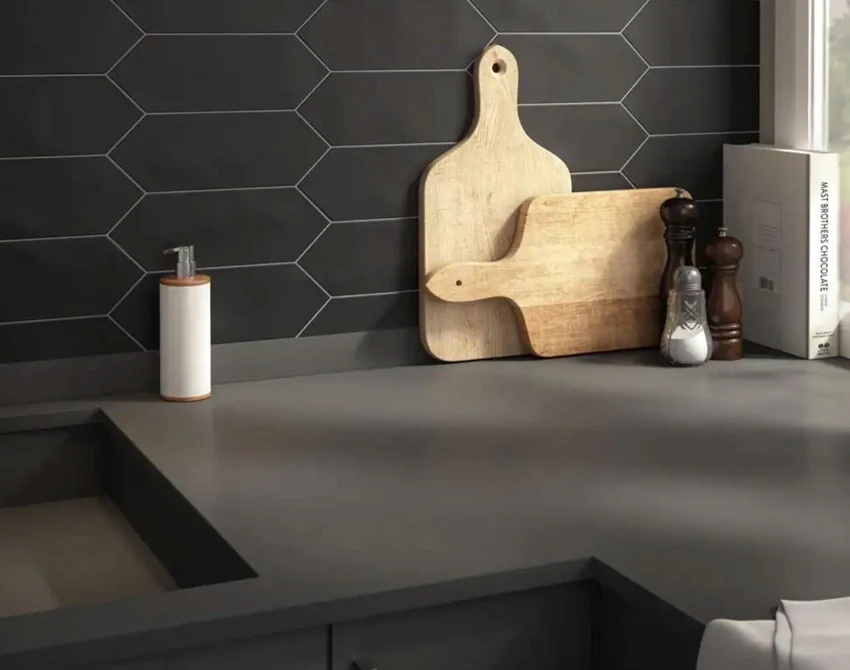 Kitchen with countertop, cutting board and black countertop