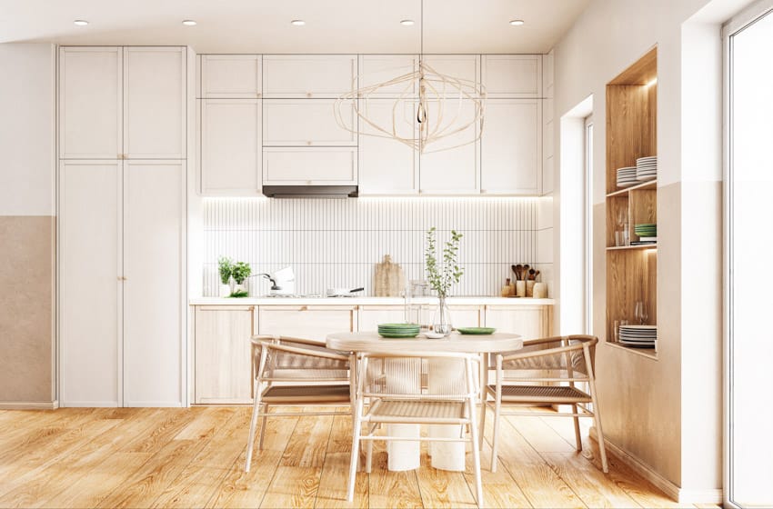 Kitchen with dining table, chairs and ceiling lights