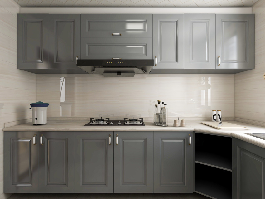Kitchen with inset cabinets, countertops, backsplash, stove, and range hood