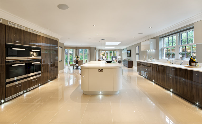 Galley kitchen with laminate island countertop and modular cabinets