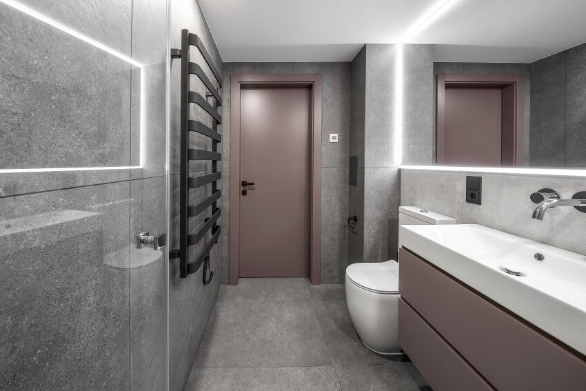 Modern minimalist bathroom interior with grey granite tiles on wall and floors
