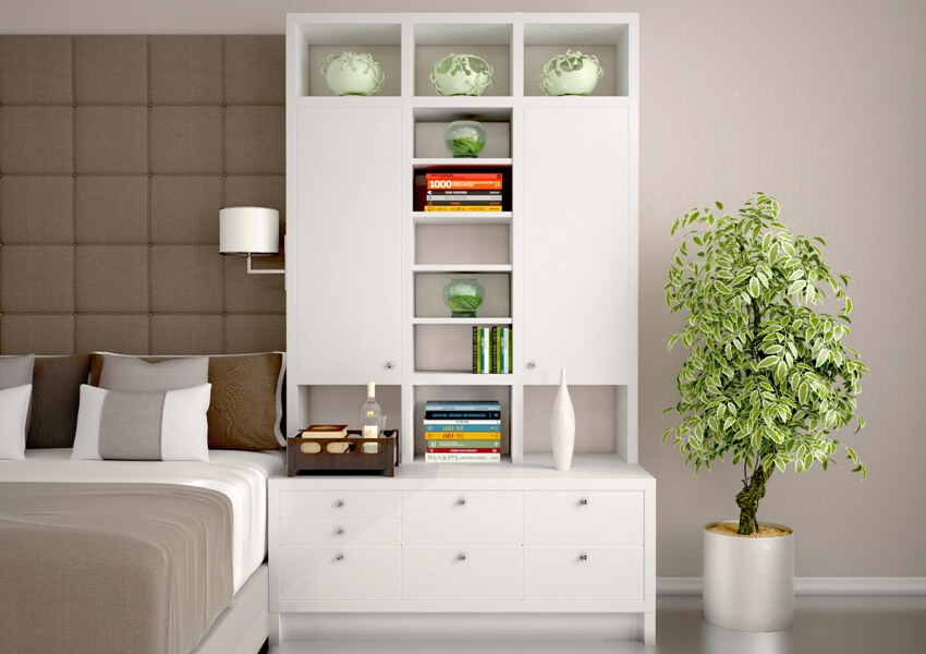 Modern style bedroom features white closet with shelves and drawers