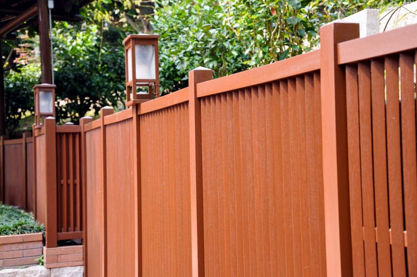 Outdoor wood fence with post lights