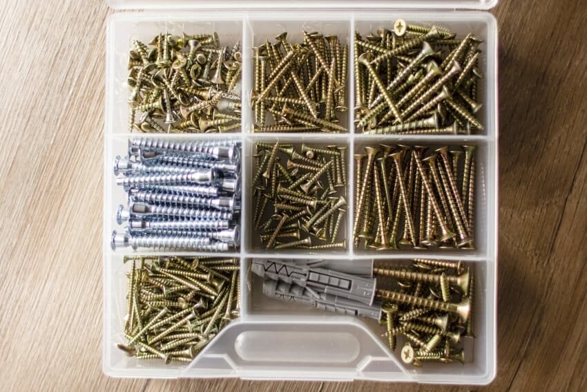Screws and nails in a plastic container box