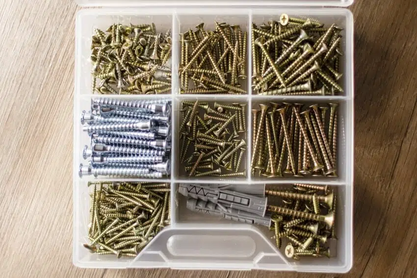 Screws and nails in a plastic container box