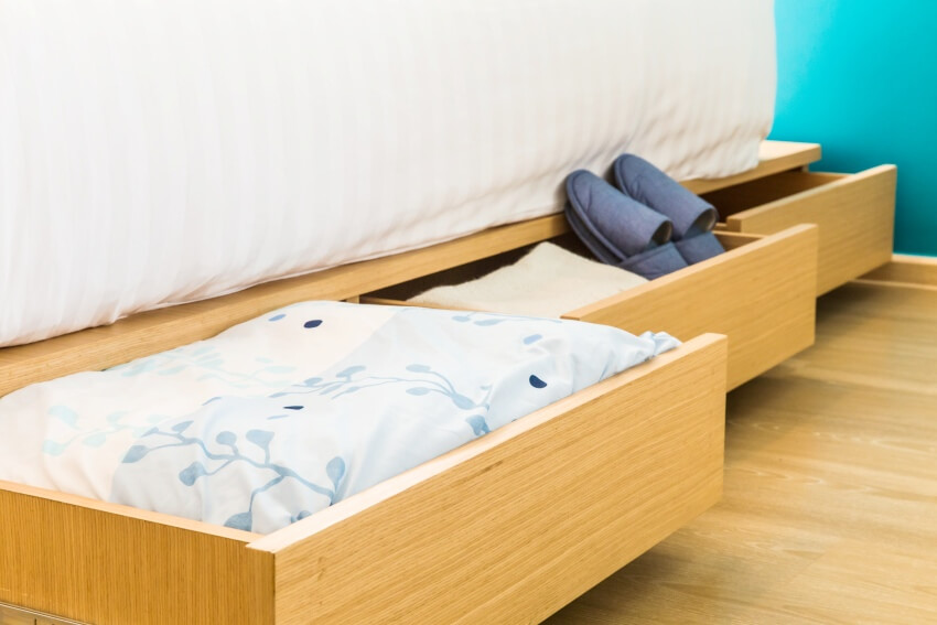 Wooden bed with drawers