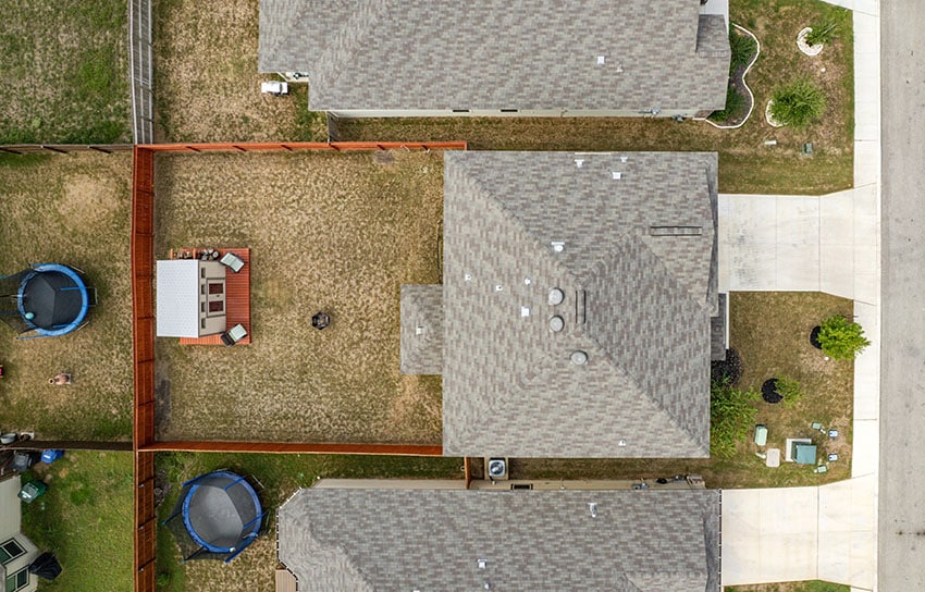 Aerial view house and lot with asphalt roof