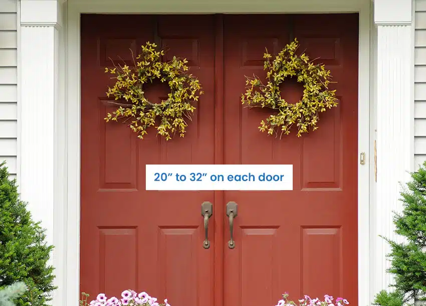 Double front door with two wreaths
