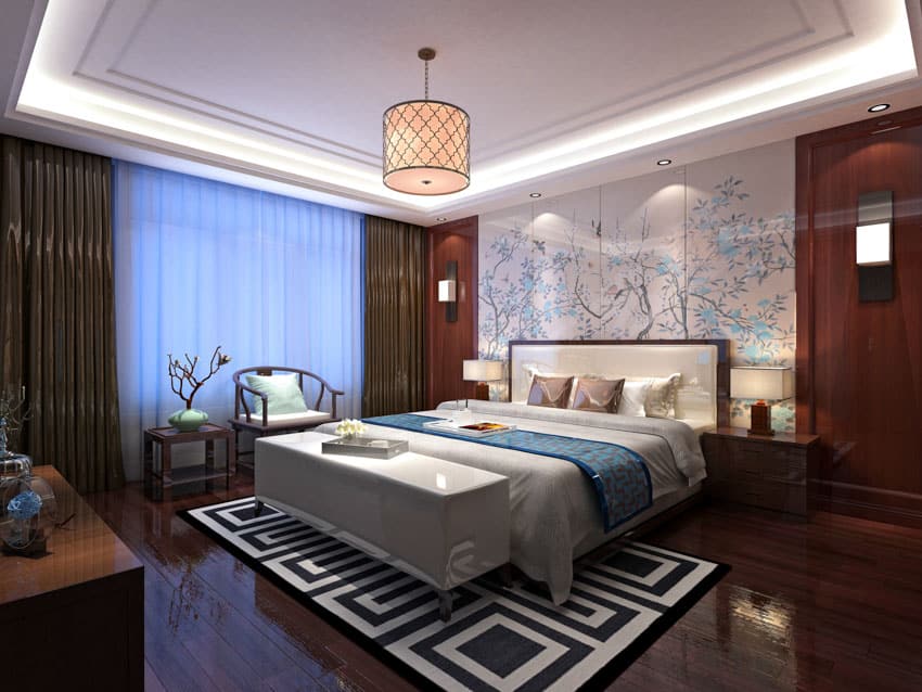 Bedroom with lights on the ceiling, sconces, rug, windows and curtains