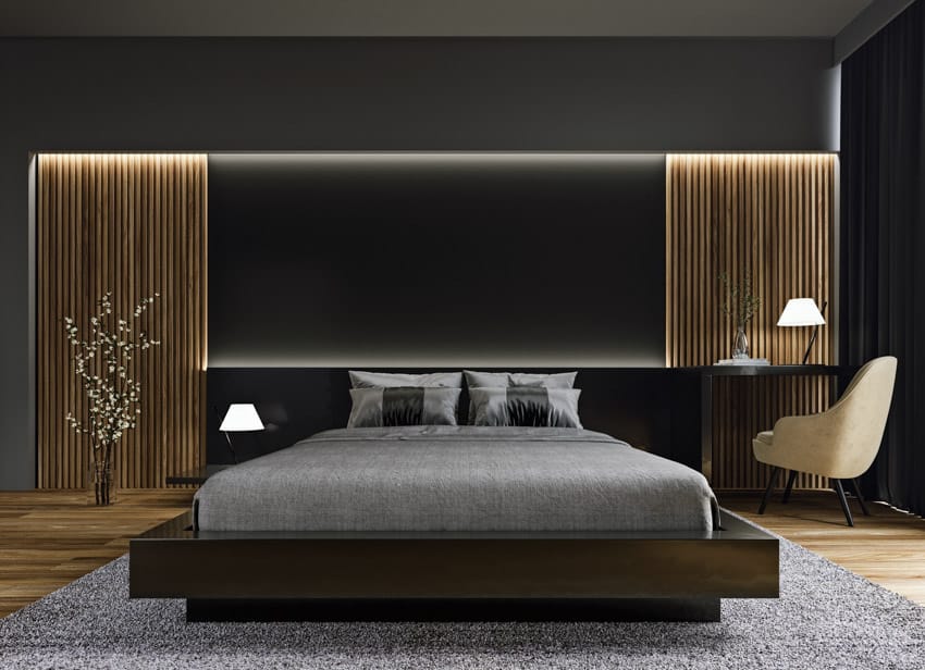 Accent lights, bed frame, desk, slat accent wall, pillows and carpet