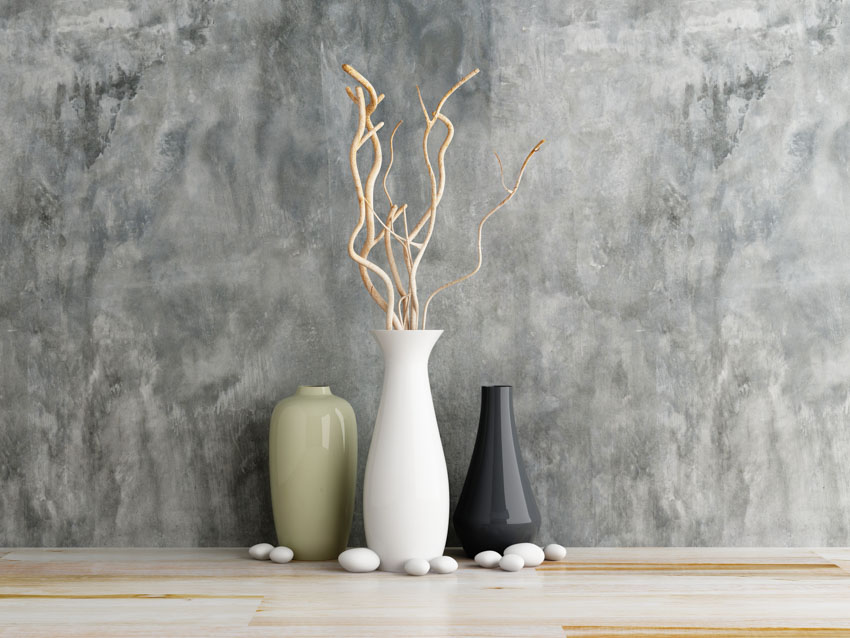 Ceramic floor vases for home interiors with concrete wall