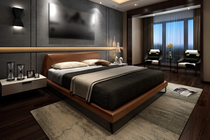Dark gray modern bedroom interior with wooden framed bed and light gray carpet