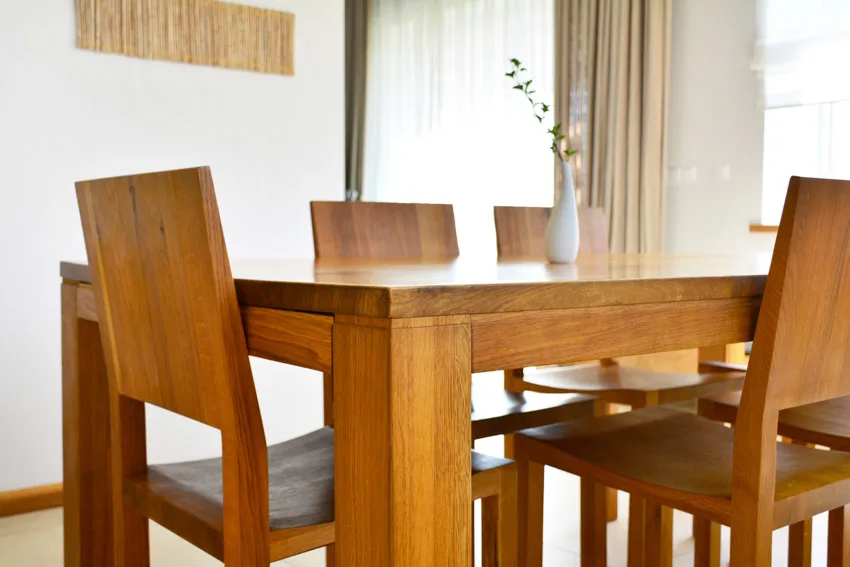 Dining room with oak wood table and chairs