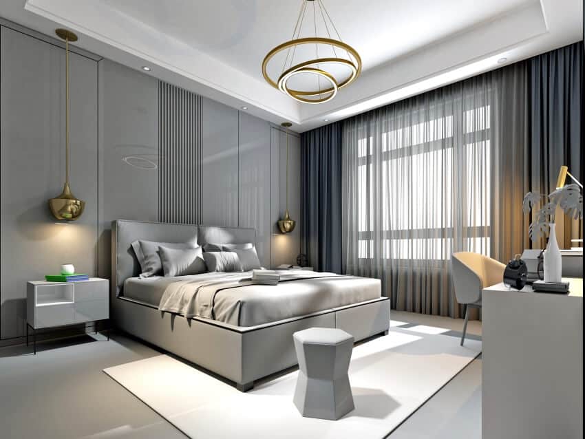 Gray tone bedroom with gold lighting fixtures and floor to ceiling curtains