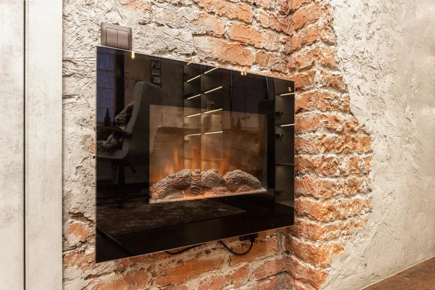 Modern fireplace in a brick wall