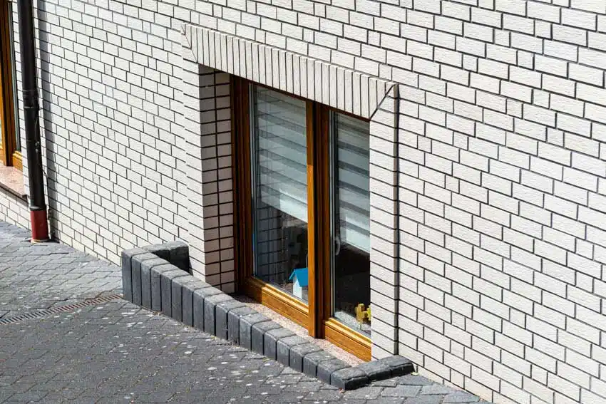 Wall cladding and window