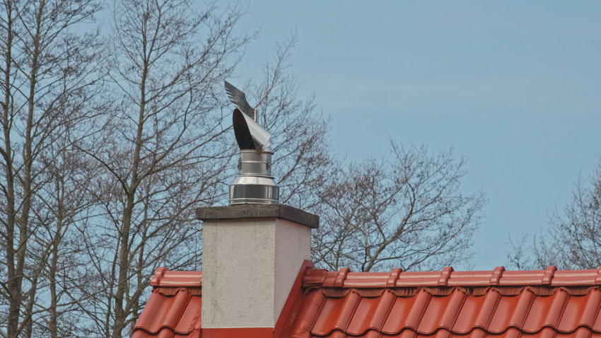 House roof with chimney liner and chimney
