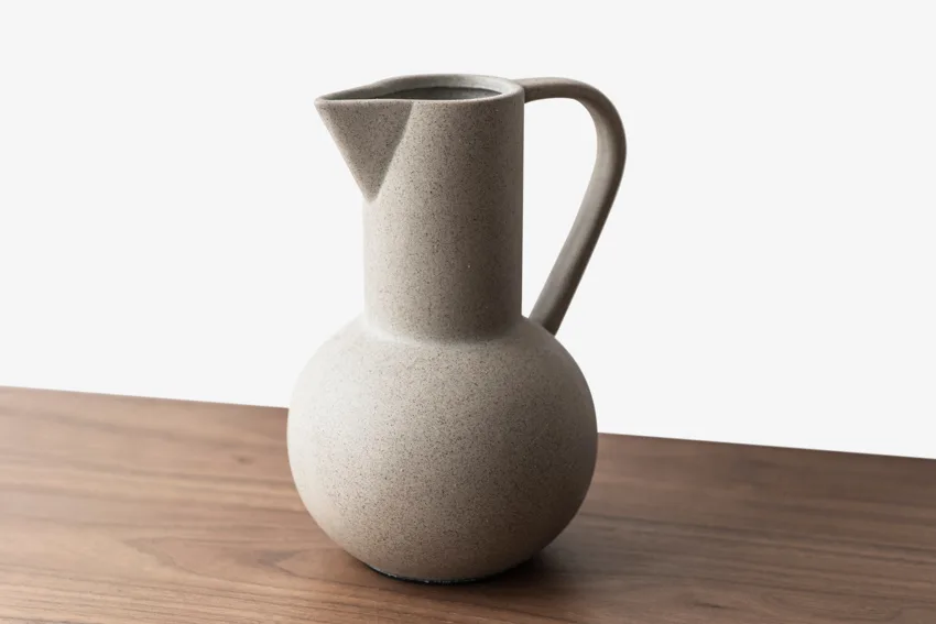 Jug vase on wood surface 