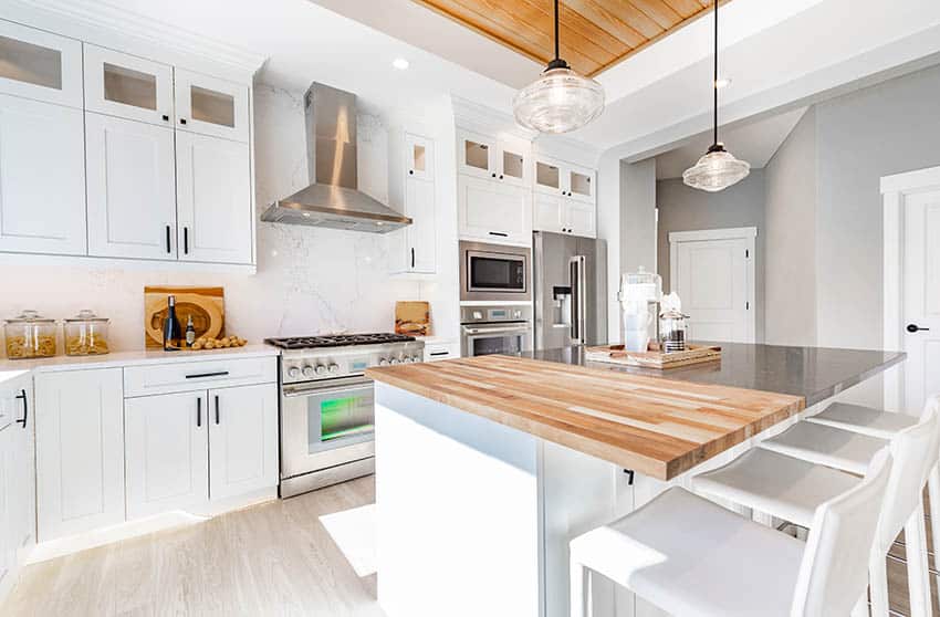 Stainless steel countertop and butcher block island