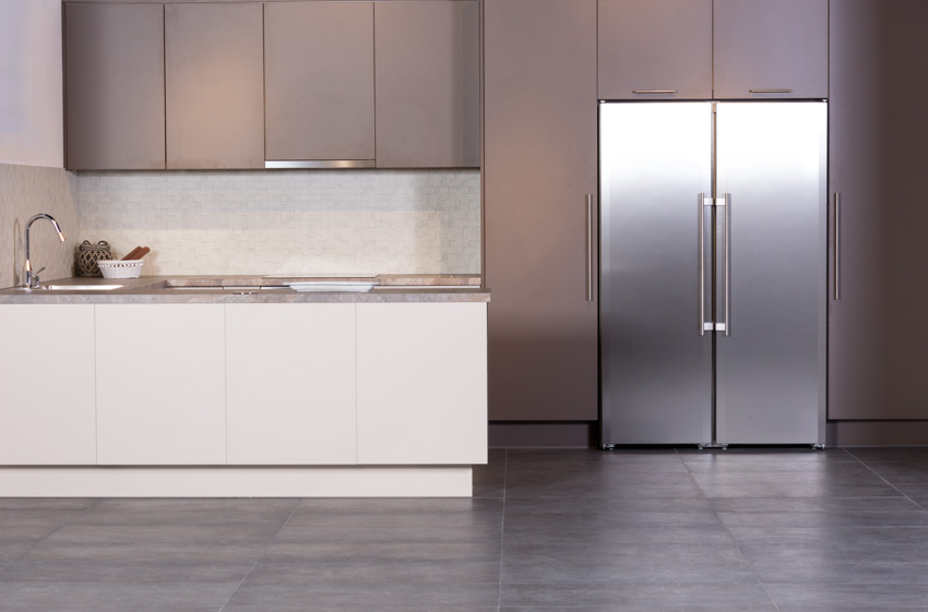 Kitchen with counter depth refrigerator