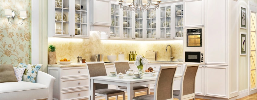 Kitchen with table, chairs, backsplash and under-cabinet lighting