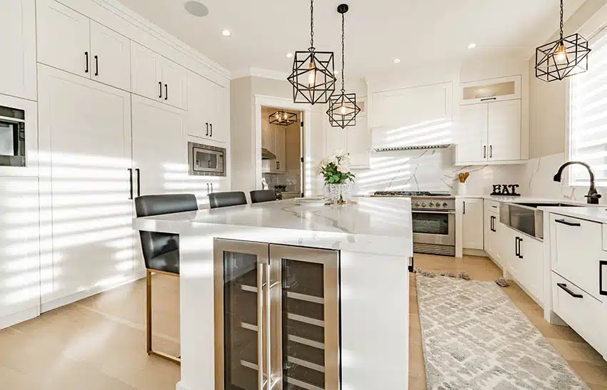 Kitchen with white cabinets matching the backsplash